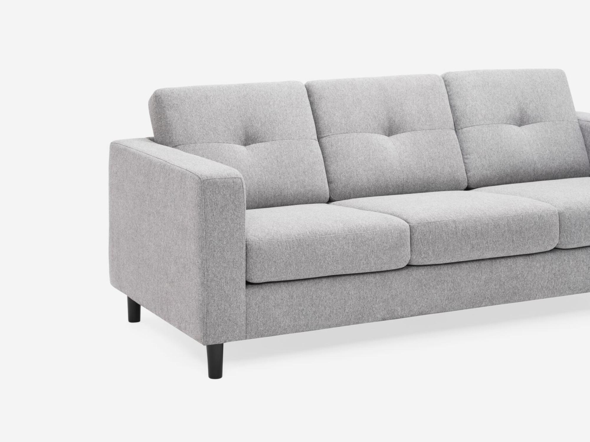 Corner view of the Solo modern couch in grey fabric